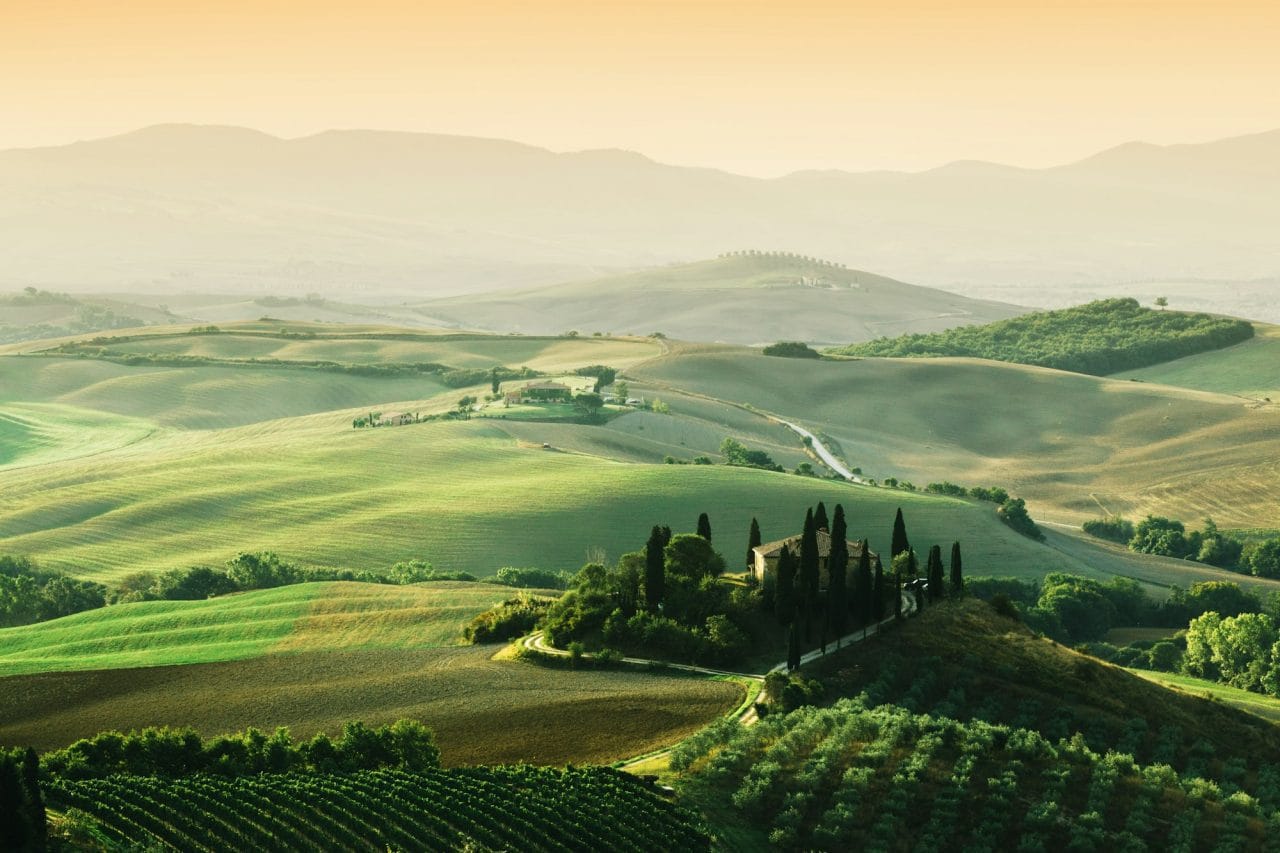 tuscany landscape at sunrise tuscan farm house vineyard hills